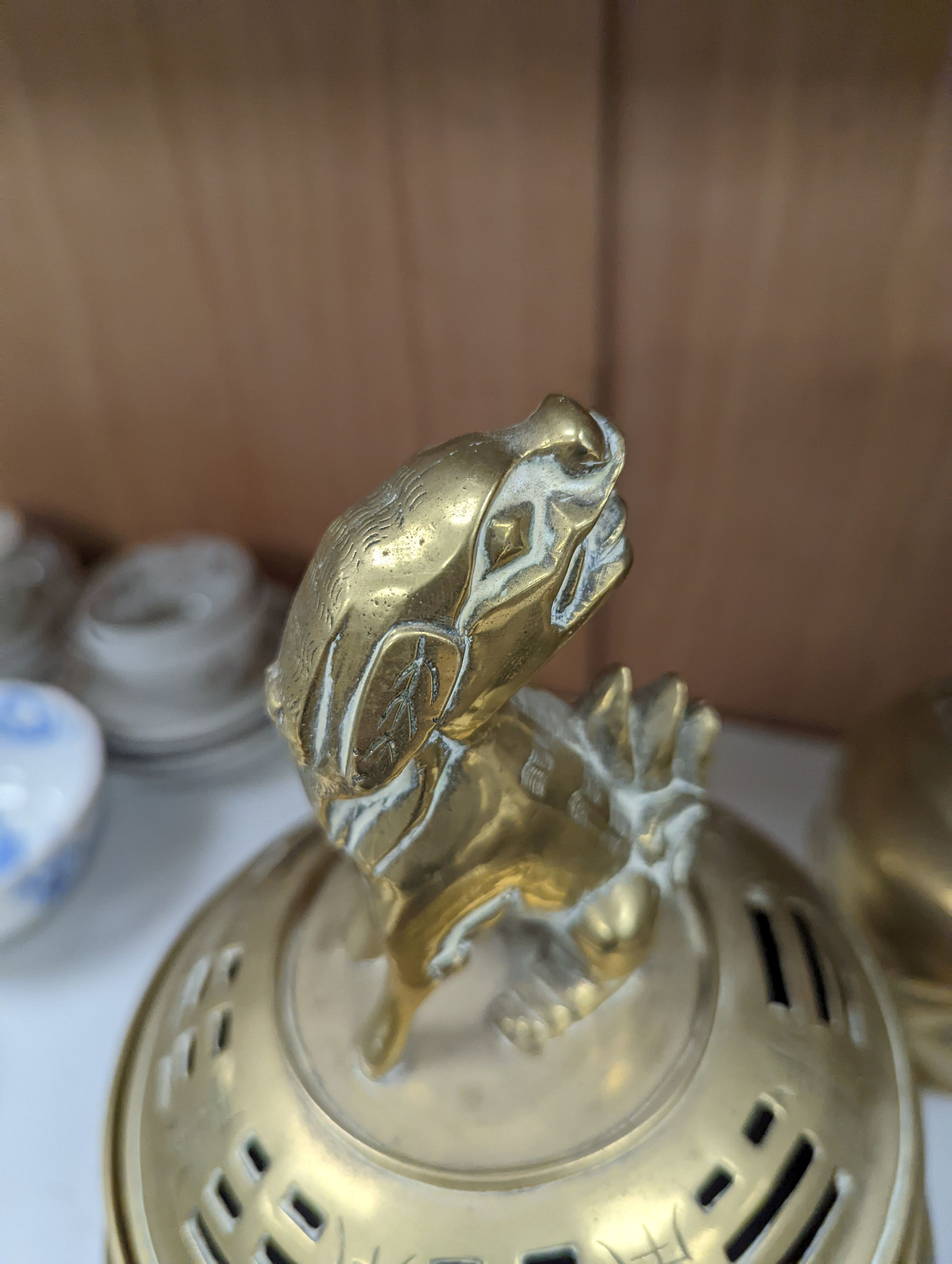 A pair of Chinese brass dragon vases, 26cm, together with two similar incense burners, tallest 30cm high